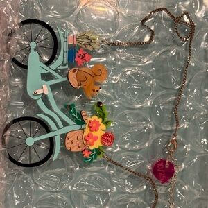 La Vidriola Bike and Squirrel necklace